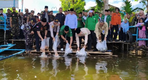 Peduli lingkungan dan Jaga Ekosistem, GP Ansor Musi Rawas Laksanakan Penenaman 1000 Pohon dan Tabur Ribuan Benih Ikan